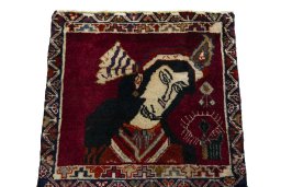 Surface texture of 2000s Shiraz rug with natural Wool and intricate pattern
