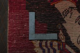 Backside of handmade 2000s Shiraz rug showing knot structure and weave density