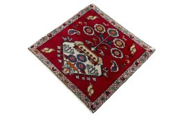 Corner detail of 2000s Shiraz rug showing border pattern and Wool pile