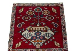 Surface texture of 2000s Shiraz rug with natural Wool and intricate pattern
