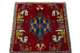 Surface texture of 2000s Shiraz rug with natural Wool and intricate pattern