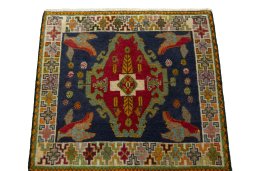 Surface texture of 2000s Shiraz rug with natural Wool and intricate pattern