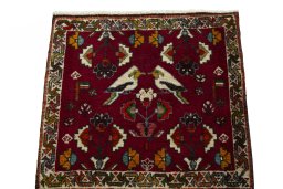 Surface texture of 2000s Shiraz rug with natural Wool and intricate pattern