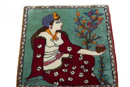 Surface texture of 2000s Shiraz rug with natural Wool and intricate pattern