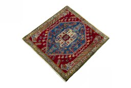 Corner detail of 2000s Shiraz rug showing border pattern and Wool pile