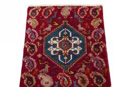 Surface texture of 2000s Shiraz rug with natural Wool and intricate pattern