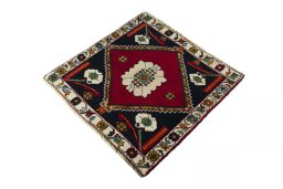 Corner detail of 2000s Shiraz rug showing border pattern and Wool pile