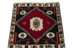 Surface texture of 2000s Shiraz rug with natural Wool and intricate pattern