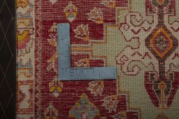 Backside of handmade 2000s Shiraz rug showing knot structure and weave density