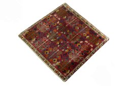 Corner detail of 2000s Shiraz rug showing border pattern and Wool pile