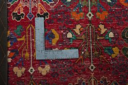 Backside of handmade 2000s Shiraz rug showing knot structure and weave density