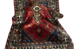 Close-up detail of 2000s Shiraz rug from Iran / Persia showing Wool weave