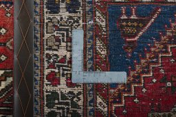 Surface texture of 2000s Shiraz rug with natural Wool and intricate pattern