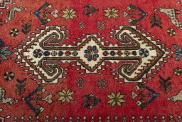 Central medallion detail of 2000s Shiraz rug from Iran / Persia