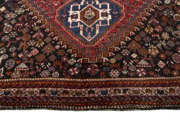 Close-up detail of 2000s Shiraz rug from Iran / Persia showing Wool weave
