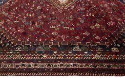 Full view of 2000s Shiraz rug from Iran / Persia, 325 × 228 cm in Red tones