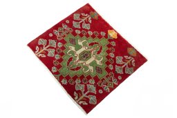 Corner detail of 2000s Shiraz rug showing border pattern and Wool pile