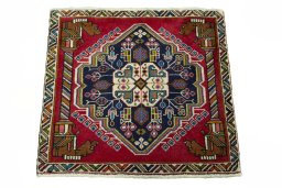 Surface texture of 2000s Shiraz rug with natural Wool and intricate pattern