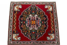 Surface texture of 2000s Shiraz rug with natural Wool and intricate pattern