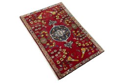 Corner detail of 2000s Shiraz rug showing border pattern and Wool pile