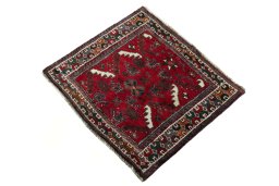Corner detail of 2000s Shiraz rug showing border pattern and Wool pile