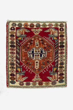 Full view of 2000s Shiraz rug from Iran / Persia, 65 × 61 cm in Red tones