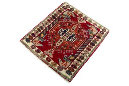 Corner detail of 2000s Shiraz rug showing border pattern and Wool pile