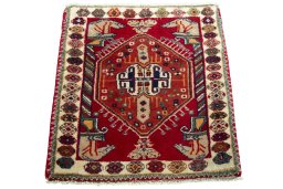 Surface texture of 2000s Shiraz rug with natural Wool and intricate pattern