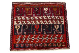 Surface texture of 2000s Shiraz rug with natural Wool and intricate pattern