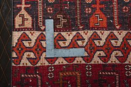 Backside of handmade 2000s Shiraz rug showing knot structure and weave density