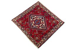 Corner detail of 2000s Shiraz rug showing border pattern and Wool pile