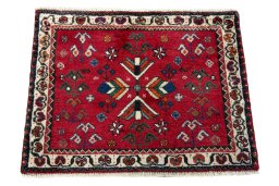 Surface texture of 2000s Shiraz rug with natural Wool and intricate pattern