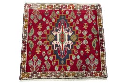 Surface texture of 2000s Shiraz rug with natural Wool and intricate pattern