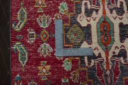 Backside of handmade 2000s Shiraz rug showing knot structure and weave density