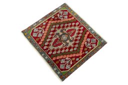 Corner detail of 2000s Shiraz rug showing border pattern and Wool pile