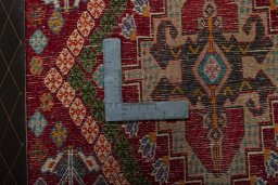 Backside of handmade 2000s Shiraz rug showing knot structure and weave density