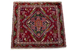 Surface texture of 2000s Shiraz rug with natural Wool and intricate pattern