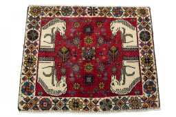 Surface texture of 2000s Shiraz rug with natural Wool and intricate pattern