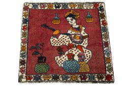 Surface texture of 2000s Shiraz rug with natural Wool and intricate pattern
