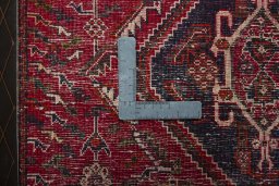 Backside of handmade 2000s Shiraz rug showing knot structure and weave density