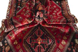 Close-up detail of 2000s Shiraz rug from Iran / Persia showing Wool weave