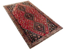 Close-up detail of 2000s Shiraz rug from Iran / Persia showing Wool weave