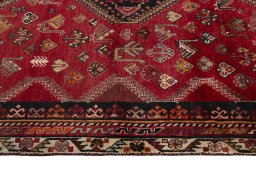 Full view of 2000s Shiraz rug from Iran / Persia, 262 × 161 cm in Red tones