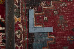 Surface texture of 2000s Shiraz rug with natural Wool and intricate pattern