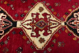 Central medallion detail of 2000s Shiraz rug from Iran / Persia