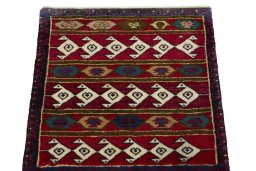 Surface texture of 1970s Shiraz rug with natural Wool and intricate pattern