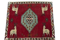 Surface texture of 1970s Shiraz rug with natural Wool and intricate pattern