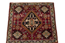 Surface texture of 1970s Shiraz rug with natural Wool and intricate pattern