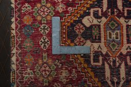 Backside of handmade 1970s Shiraz rug showing knot structure and weave density
