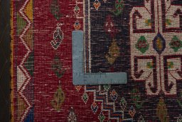 Backside of handmade 1970s Shiraz rug showing knot structure and weave density